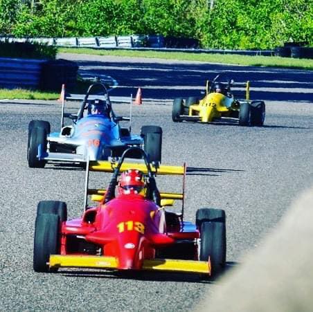 Formula Mazdas racing wheel to wheel