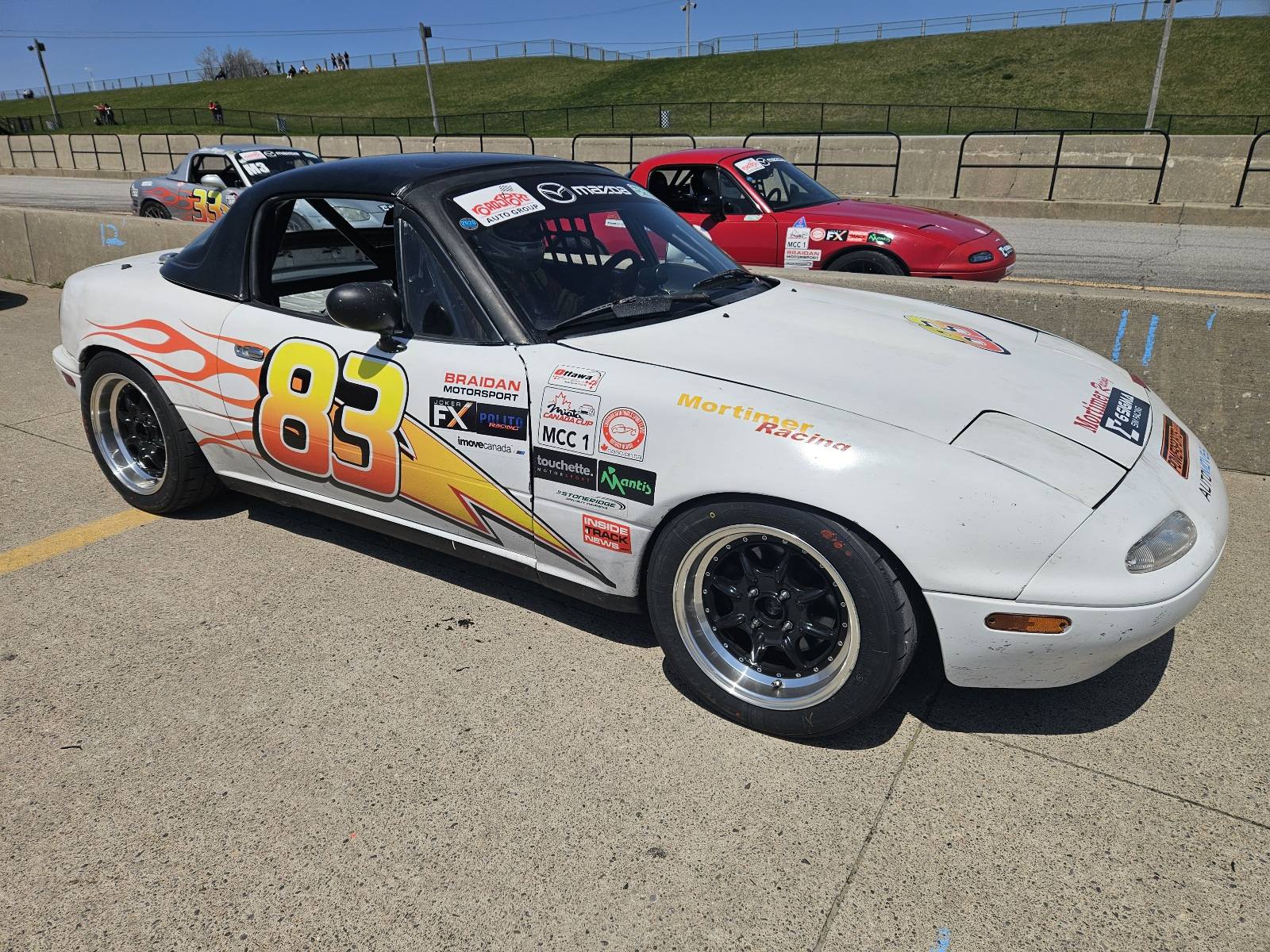Spec Miata #83 paddock