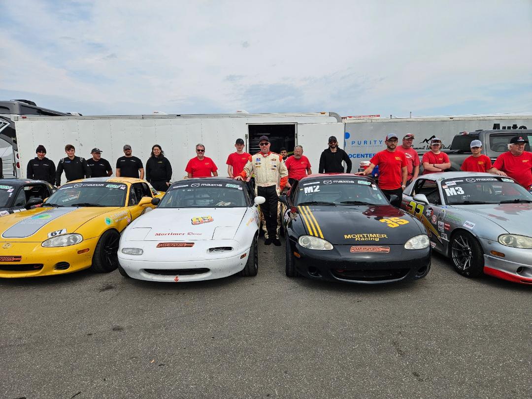 Mortimer team and Miata fleet at Calabogie