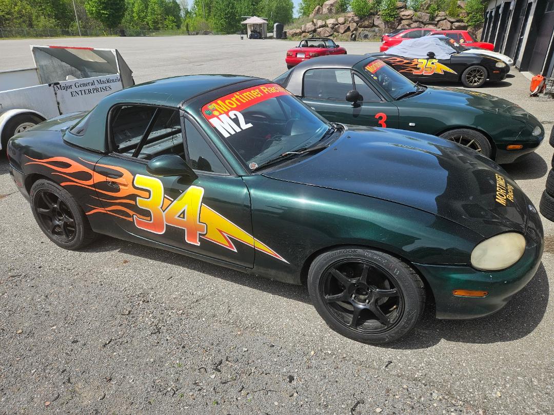 Spec Miata #34 in paddock